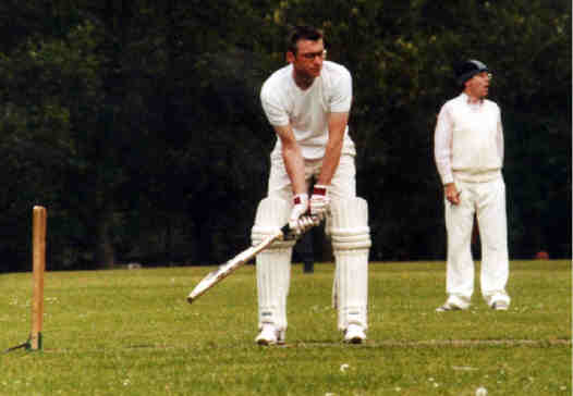 Jun15-00ClarkeBats-FrisbyUmpires